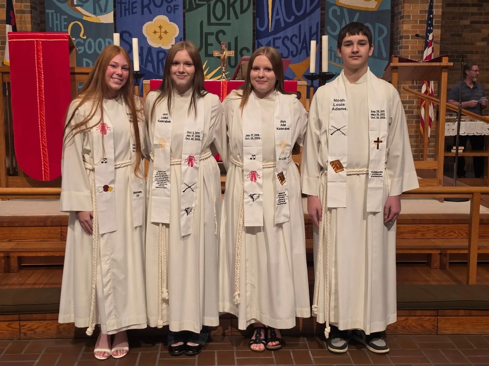 The 2026 confirmation class at Our Savior’s, left to right: Adeline Wierson, Jena Kaderabek, Jaya Kaderabek, and Noah Adams.